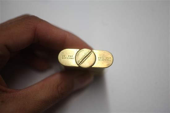 A Dunhill 14ct gold lighter, 47mm.